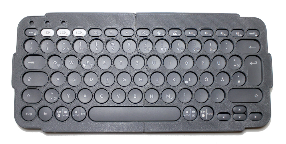 Fingerführraster - Logitech © Pebble Keys 2